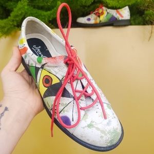 Abstract lace up shoe.